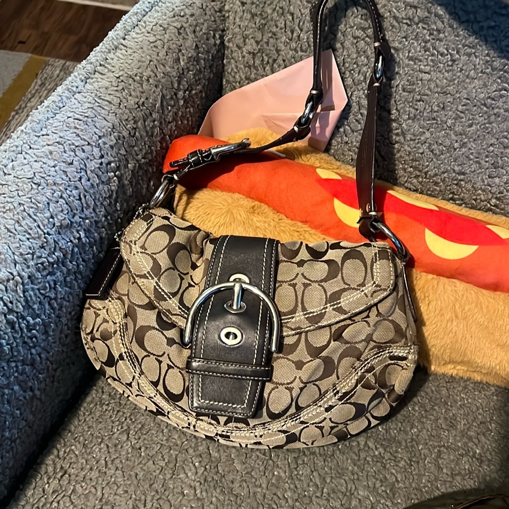 coach soho braided strap some wear to the fabric and hardware